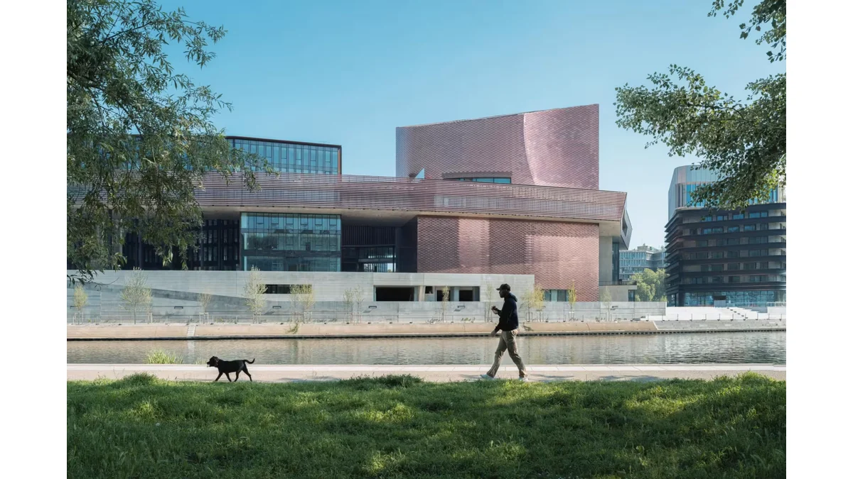Nicolas Trouillard’s panoramic photograph shows Large art centre and its metal exterior beside the Seine on Île Seguin.