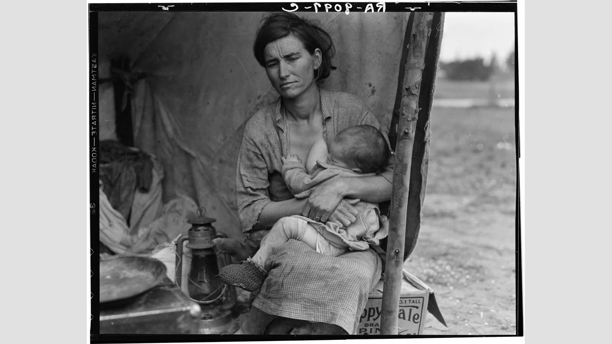 Florence Owens Thompson holding a child inside a tent in a wider frame from Dorothea Lange’s 1936 Migrant Mother sequence